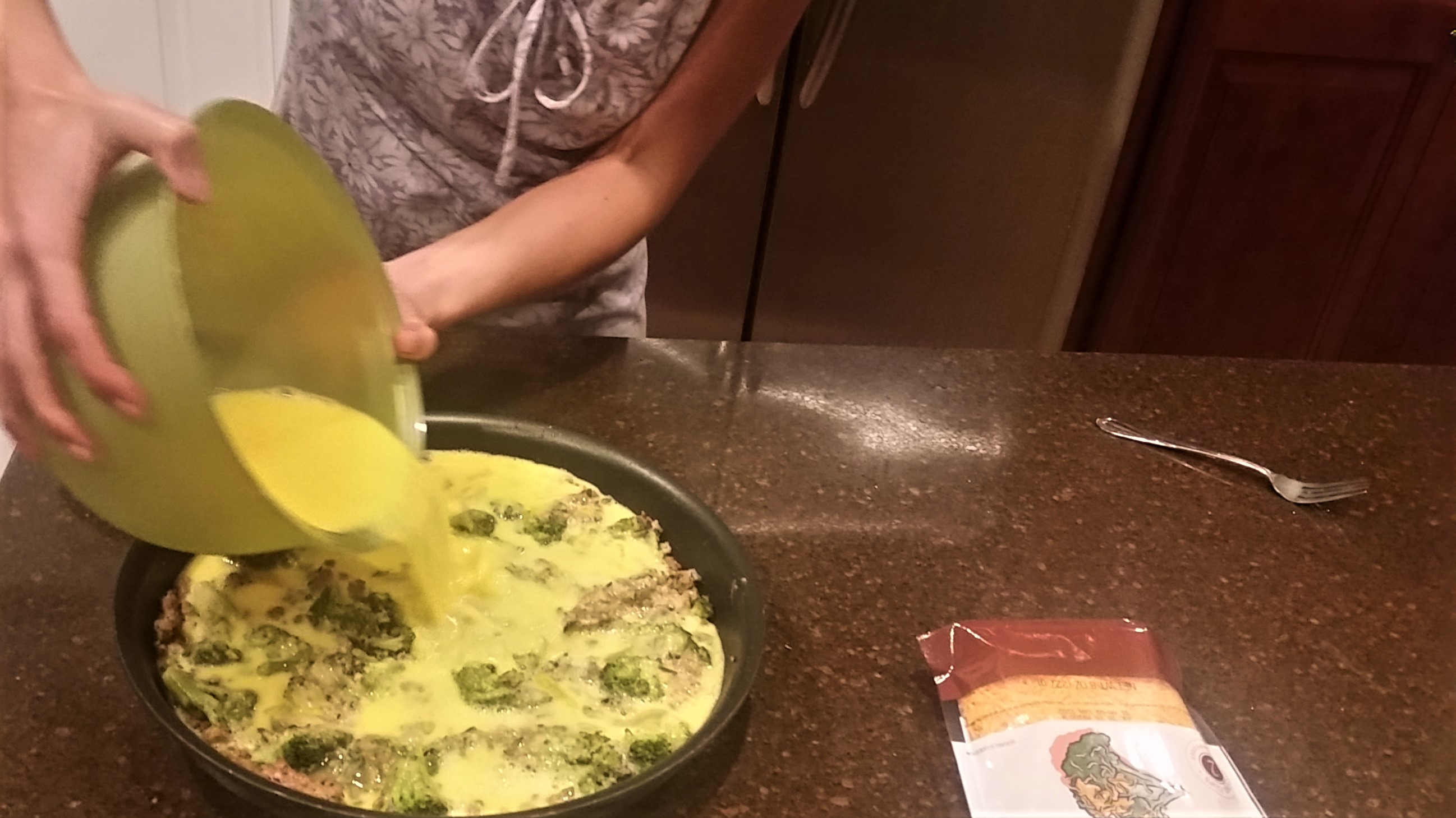 Pouring egg mixture over quiche ingredients! crustless quiche