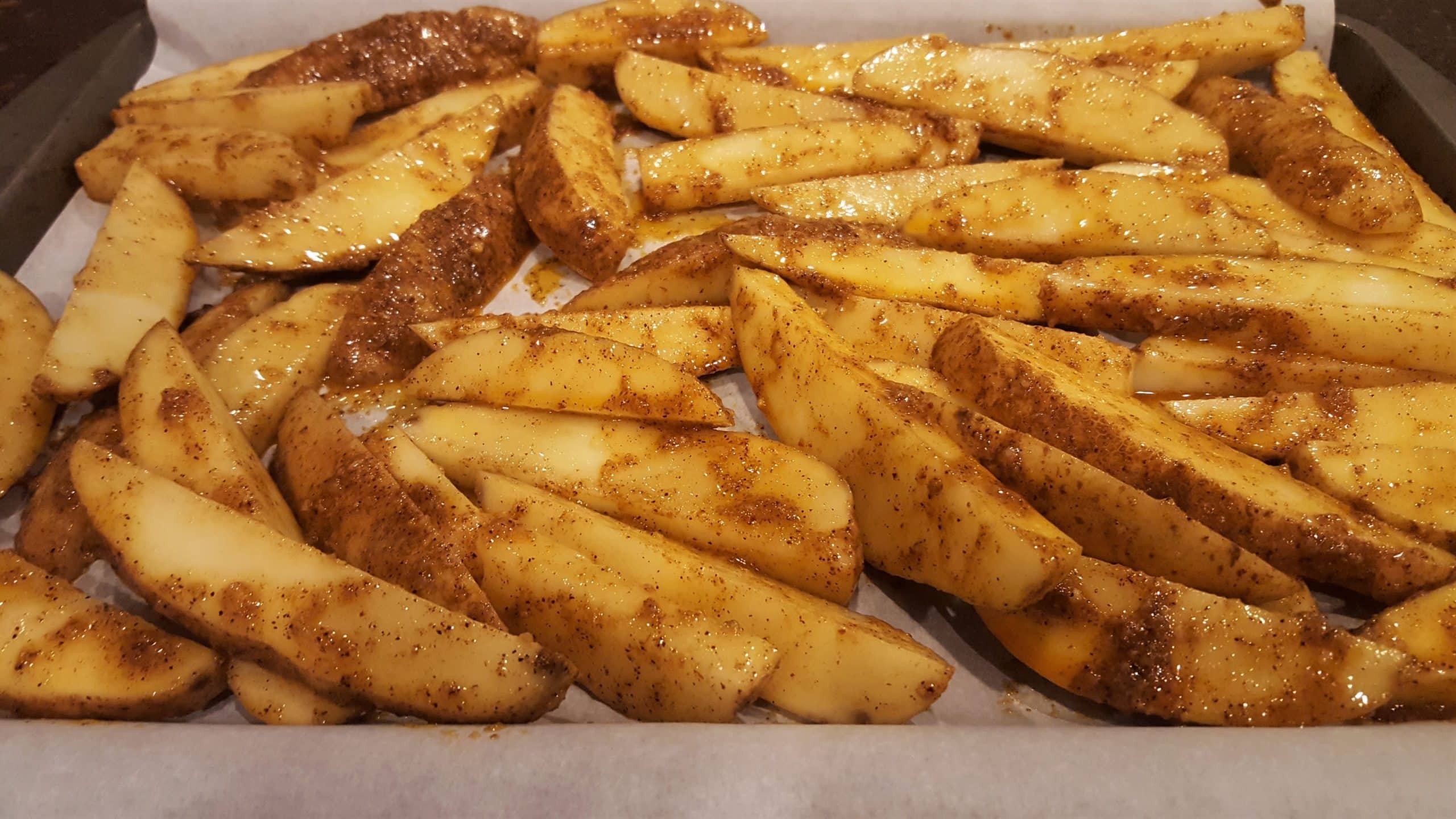 Taco Garlic Seasoned Potato Wedges ready to bake - Dining in with Danielle