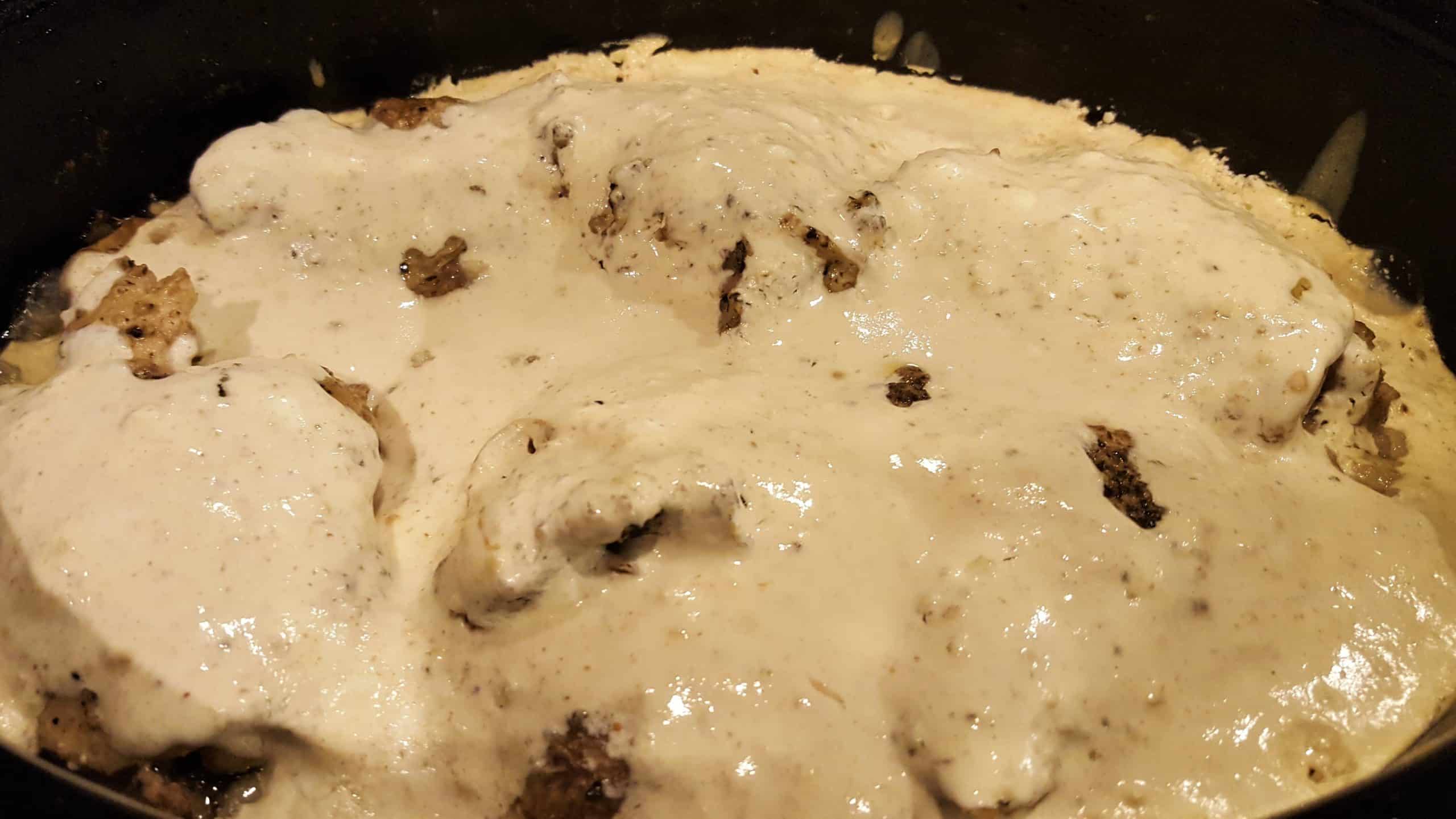 Creamy Garlic Sauce Smothered over Chicken Thighs and Rice - Dining in with Danielle
