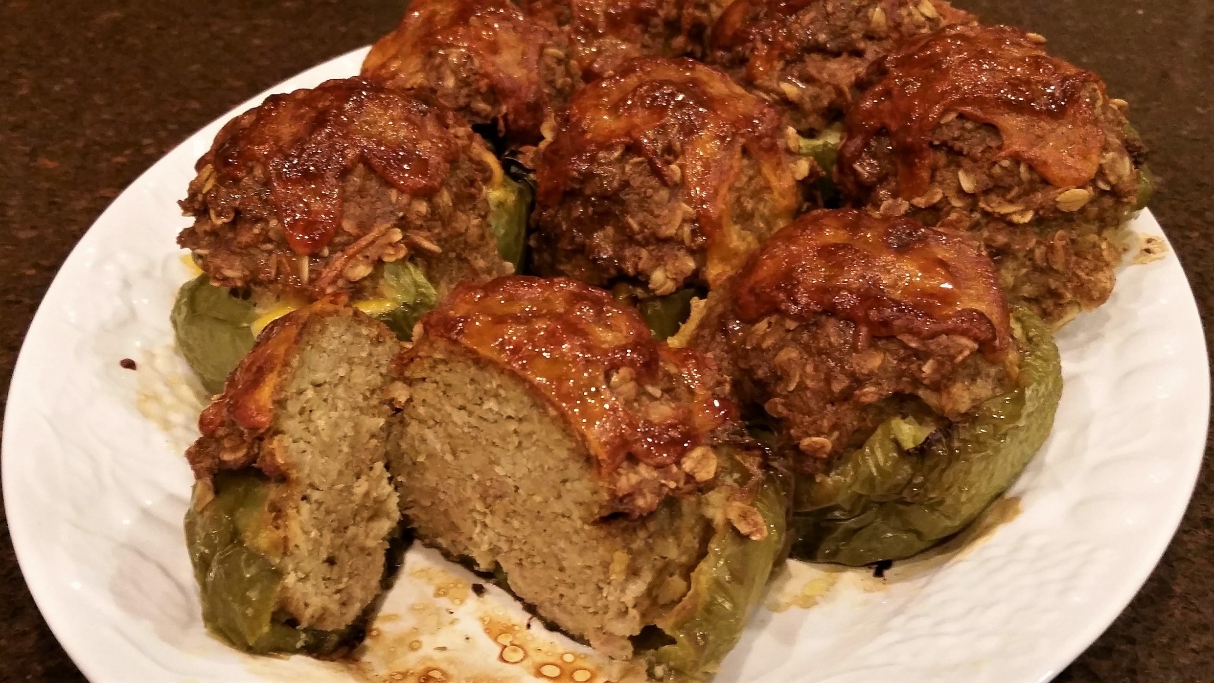 Turkey Meatloaf stuffed in to Peppers and Baked, topped with Cheese and Baked until Crispy! Stuffed Bell Peppers Baked with Meatloaf