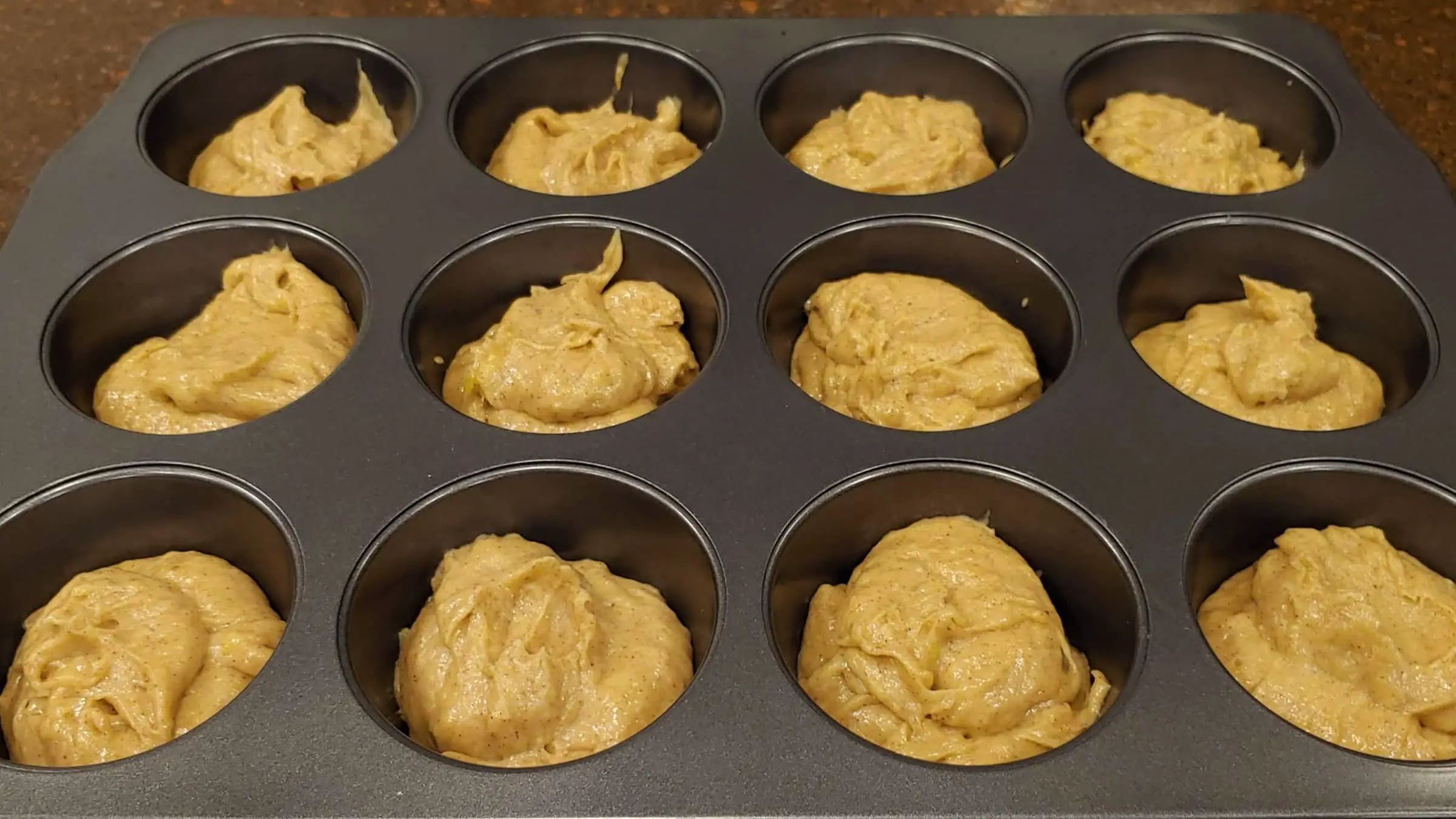 Banana Muffins in Muffin Pan ready to Bake - Dining in with Danielle