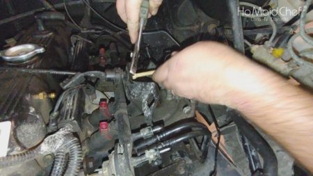 Removing the Vacuum Hoses, Wires, and Injector Plugs On A Jeep Wrangler YJ - Chris Does What